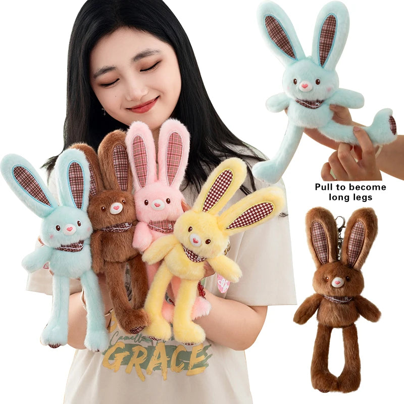 A woman holds several plush rabbit toys in various colors including blue, brown, and pink.