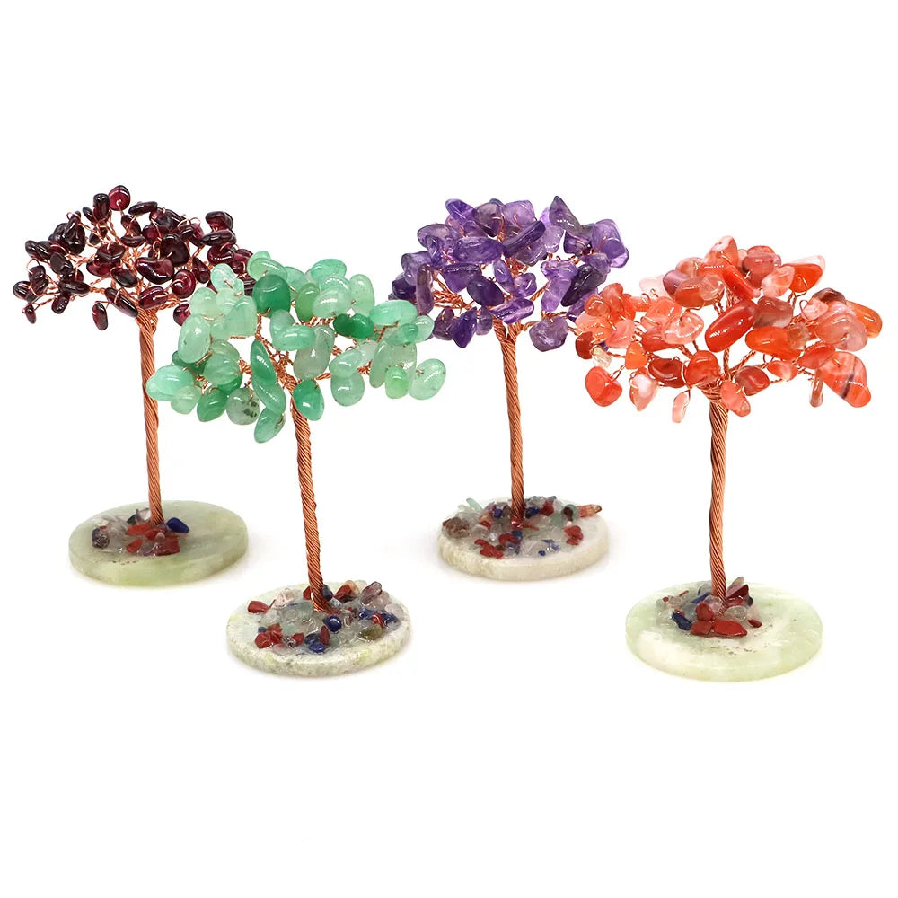Three natural crystal money trees featuring green, purple, and orange crystals on copper wire stems.