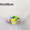 A white mesh storage hammock organizer holding various colorful stuffed animals.
