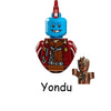 A minifigure of a character with blue skin and a red helmet, set against a white background.
