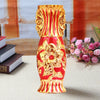 A gold-plated ceramic tabletop vase with red and gold floral patterns.