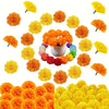 A collection of artificial orange and yellow marigold and carnation flowers for festive decoration.