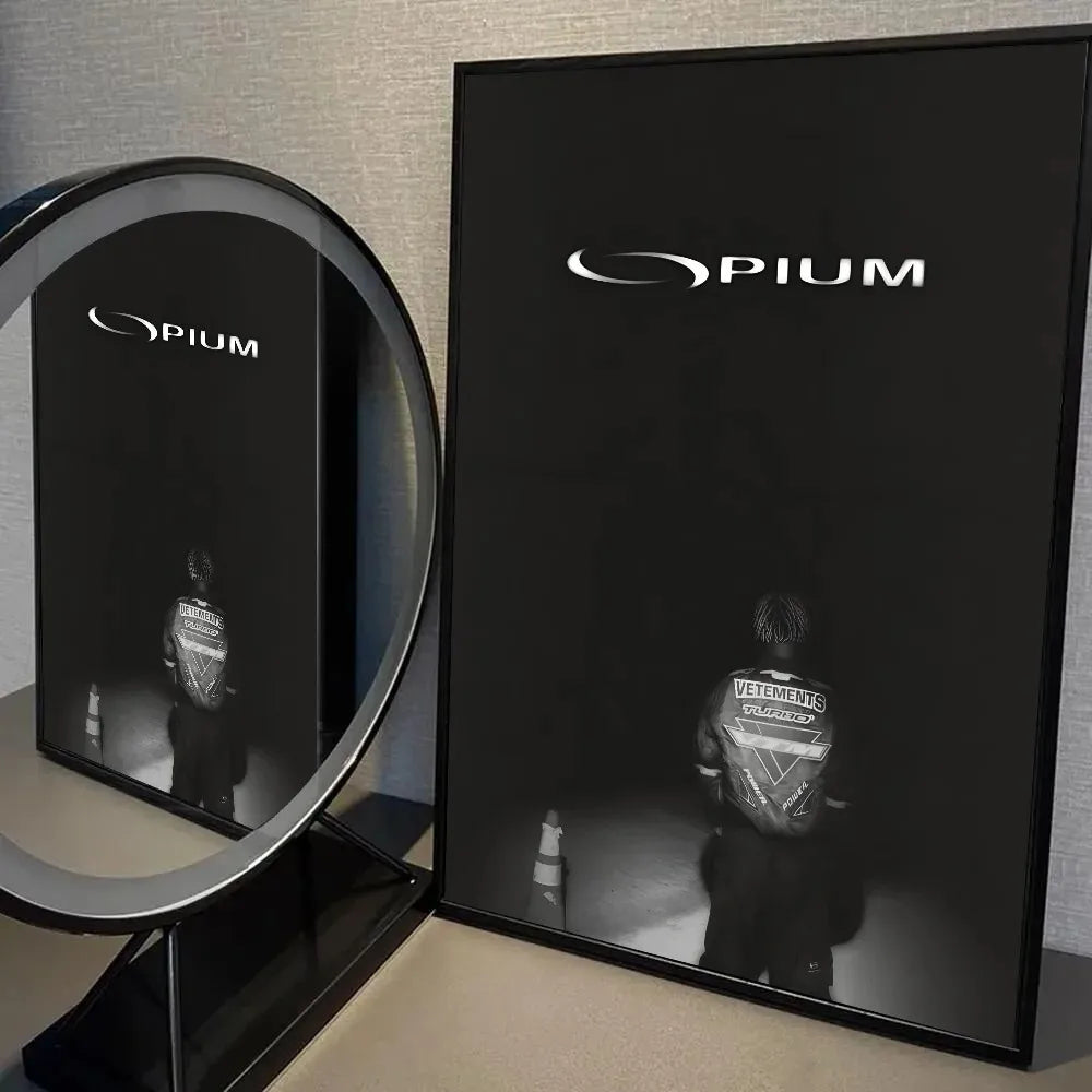 Black framed canvas wall art featuring the PIUM logo and a silhouette of Playboi Carti