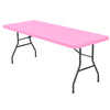 A pink stretch spandex tablecloth set with black metal legs.