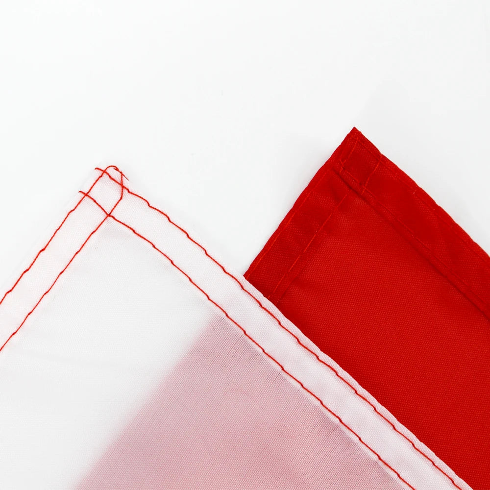 Red and white fabric tapestry featuring a Chilean flag design with brass grommets.