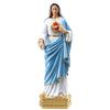A statue of the Blessed Mother Mary with a white and blue robe holding a rose flower.