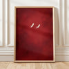 A framed canvas wall art featuring two white cranes against a deep red background.