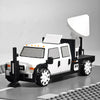 A black and white 3D printed display model of a vehicle, resembling an interceptor, with a large dome on top.