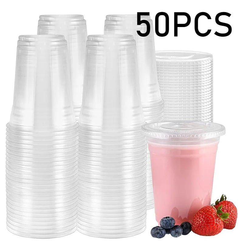 A stack of 50 clear plastic disposable cups with lids and a few fresh strawberries.