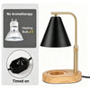 A black adjustable flameless candle warmer lamp with a brass finish and a wooden base.