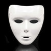 A white performance mask for dance or cosplay, shown from the front with a reflective surface below.