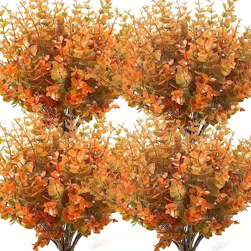 Artificial fall flower bouquet featuring warm orange and brown foliage for home and garden decor