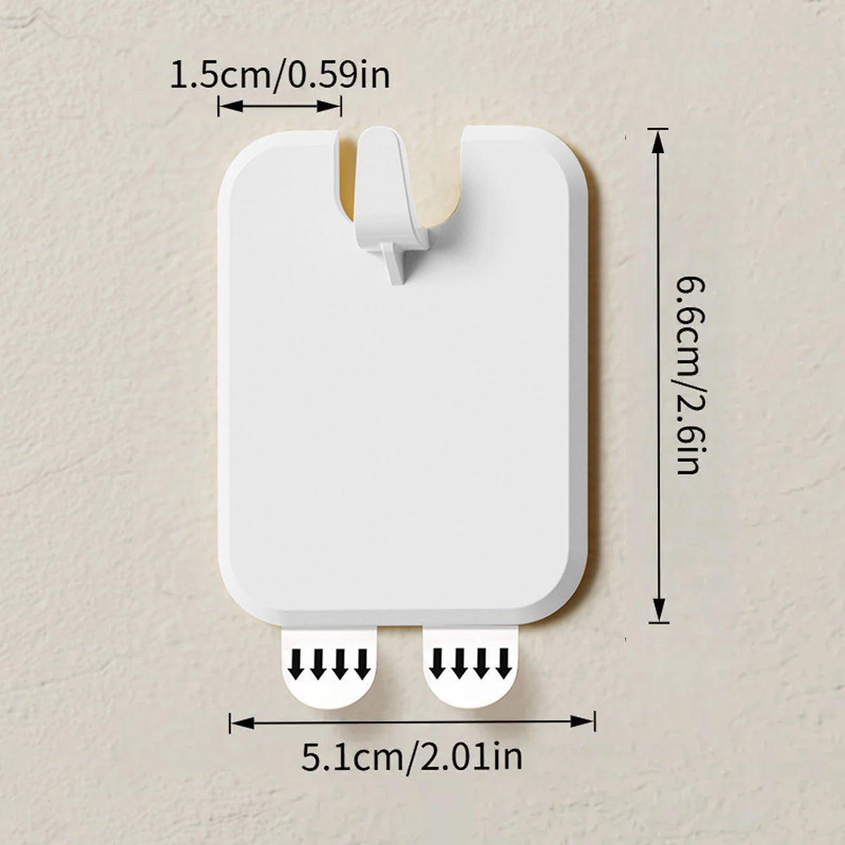 A white self-adhesive picture hanging hook with a rectangular body and two downward-facing hooks.
