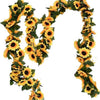 A green and yellow silk sunflower vine garland shaped like the letter M for weddings and home decor