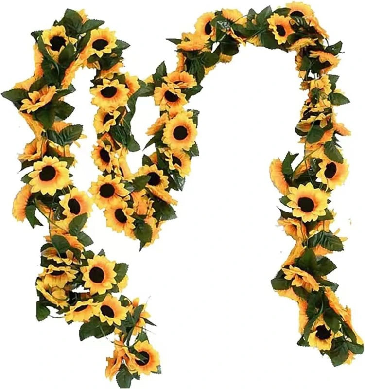 A green and yellow silk sunflower vine garland shaped like the letter M for weddings and home decor