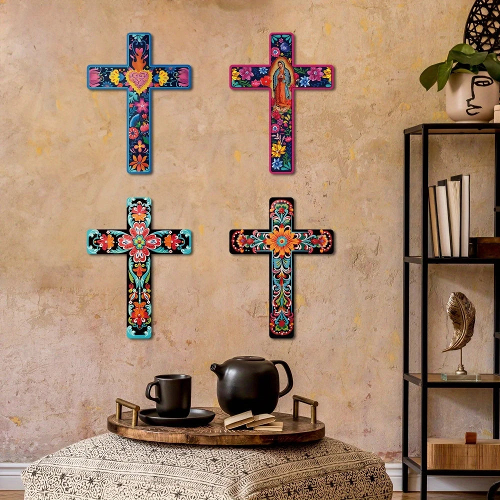 Four colorful wooden cross wall art pieces with floral designs displayed on a textured wall.