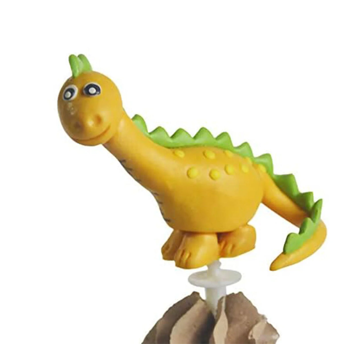 Figura de dinosaurio amarillo con púas verdes sobre una base marrón.