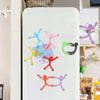 Colorful flexible mini figure refrigerator magnets featuring various colored figures on a white surface.