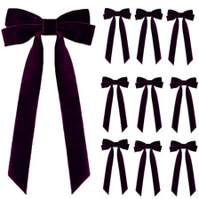 A pack of ten dark purple velvet Christmas tree bows in various styles and sizes.