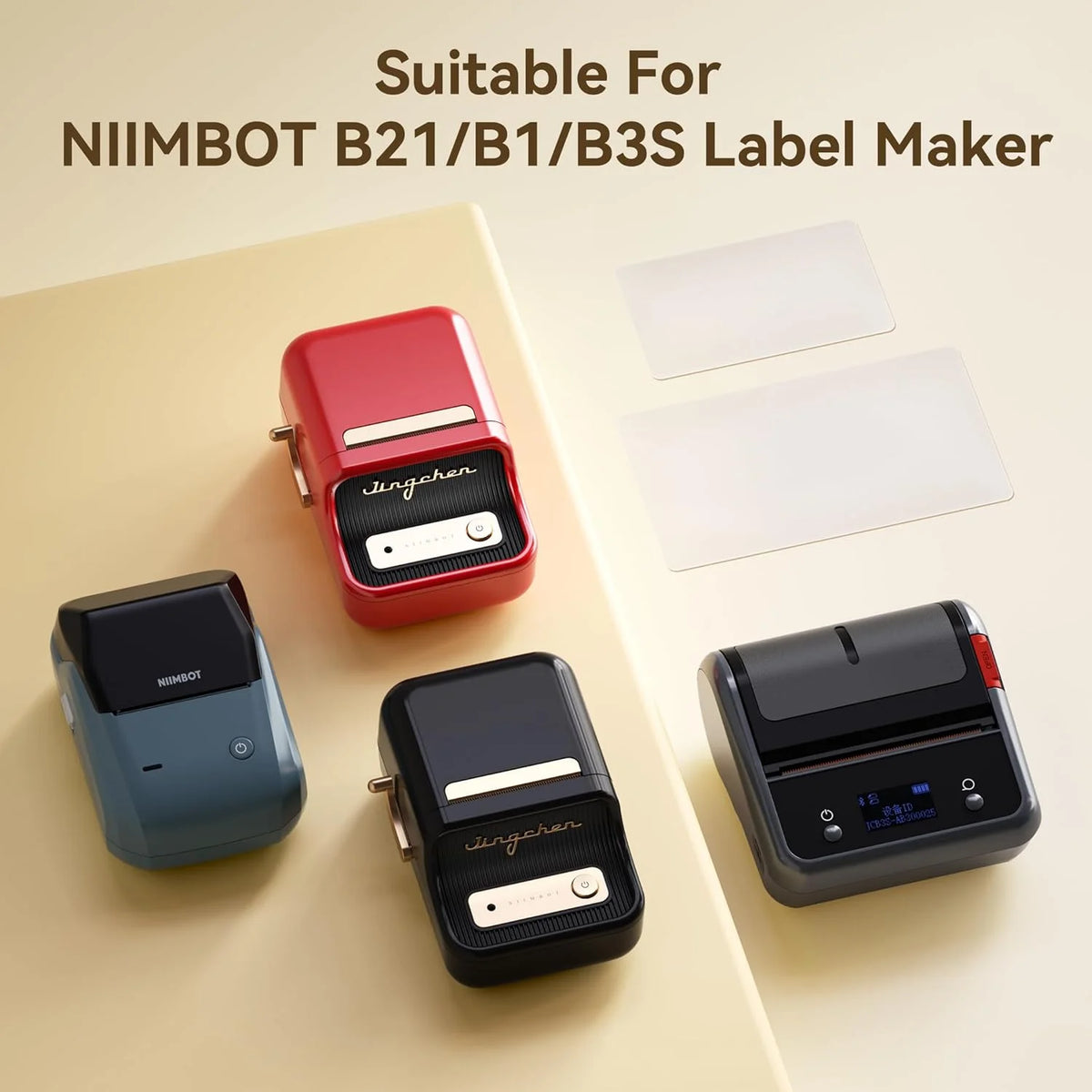 A set of thermal label paper rolls and a mini label maker are displayed on a light surface.