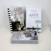 A set of three books titled Elements of Style, White, and Living with White by The White Company.