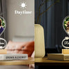 A pair of personalized acrylic photo frames engraved with names Rachel and Steven, displayed next to a daytime and night ligh