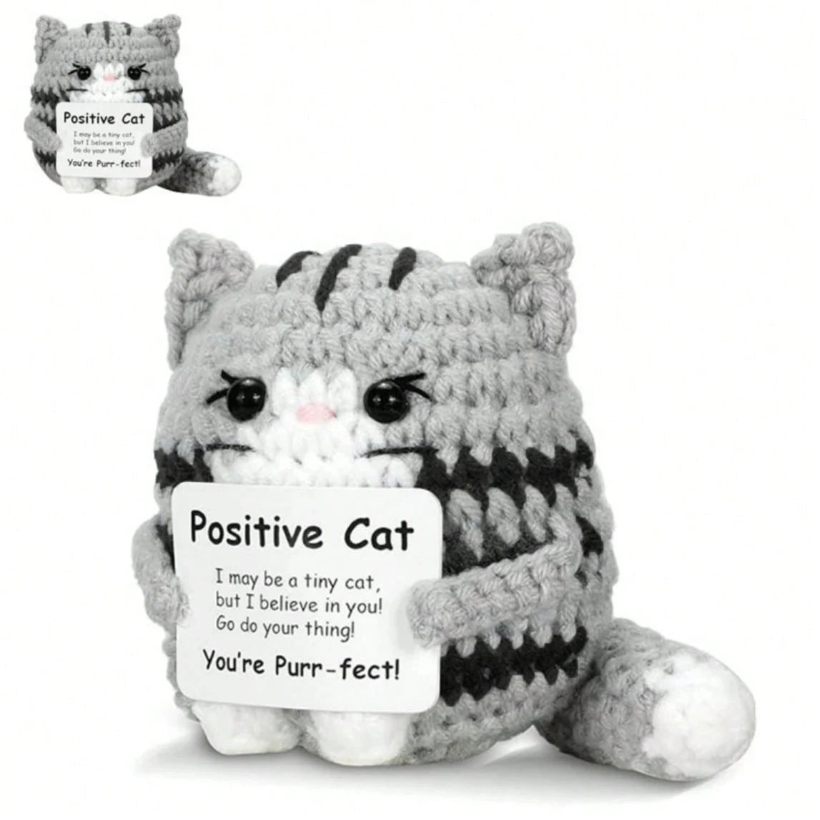 A gray knitted cat plush pendant with a card that reads Positive Cat You're Pure-fect
