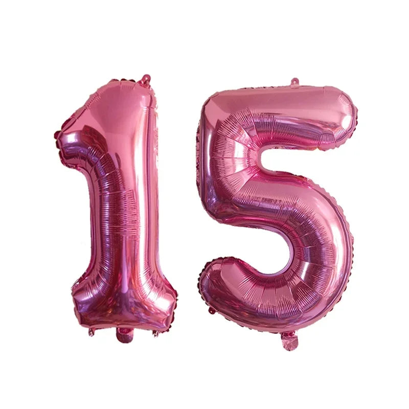 Two pink helium foil number balloons shaped like 1 and 5