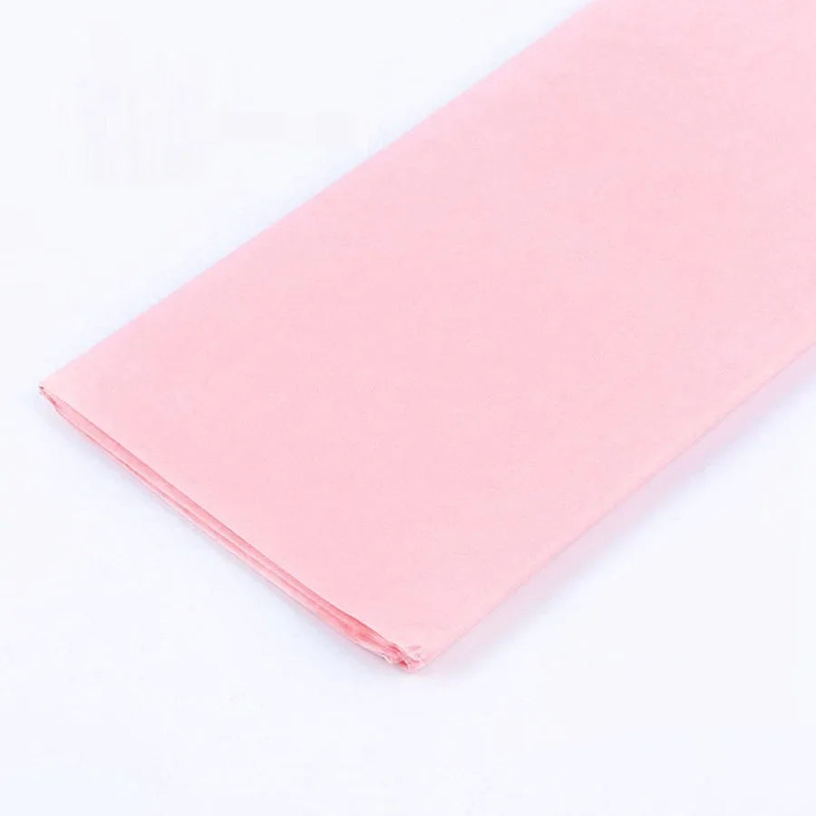 A pink sheet of soft tissue paper for gift wrapping and DIY crafts.