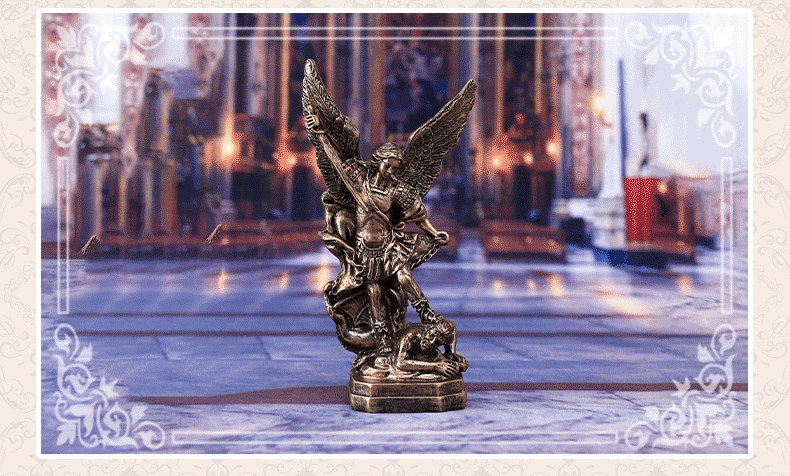 Bronzed Saint Michael Archangel resin figurine with wings and a figure below it.