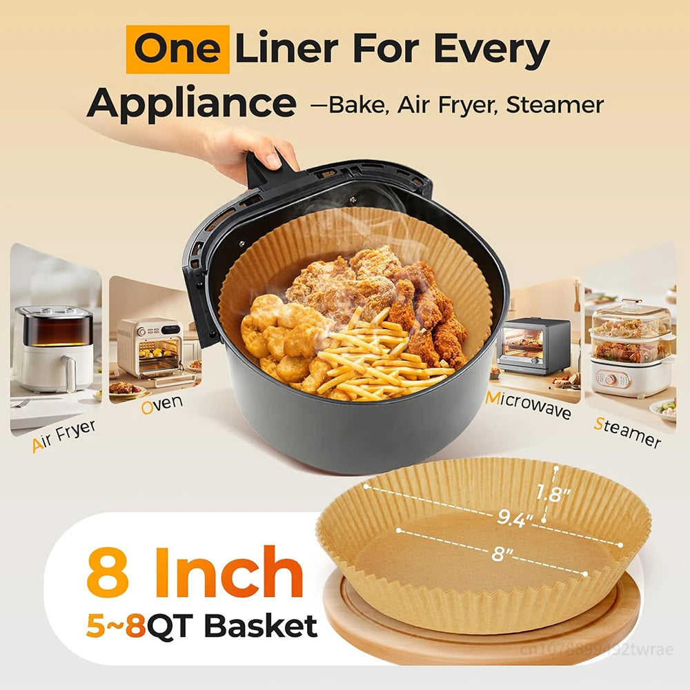 A black air fryer basket filled with fried food, surrounded by disposable round paper liners.