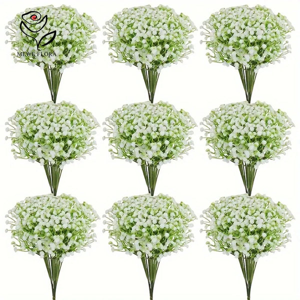 A bouquet of white baby's breath flowers in a green arrangement for weddings and home decor.