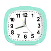 A light mint green analog alarm clock face showing 12 o'clock with black numbers and yellow hands.