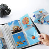 Una mano sostiene una hoja de carpeta de photocards de Kpop con diseños de frutas coloridas.