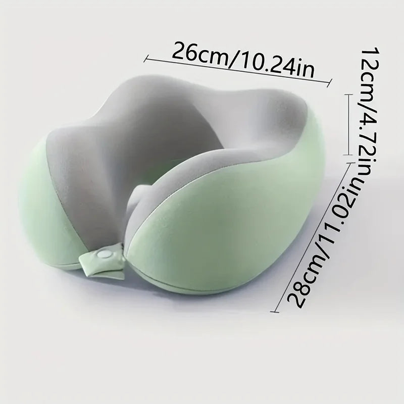 Light green U-shaped memory foam neck pillow shown with dimensions.