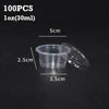 A set of 100 disposable clear plastic sauce cups with lids shown against a dark background.