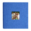 A blue linen scrapbook memory book with a photo of a family.