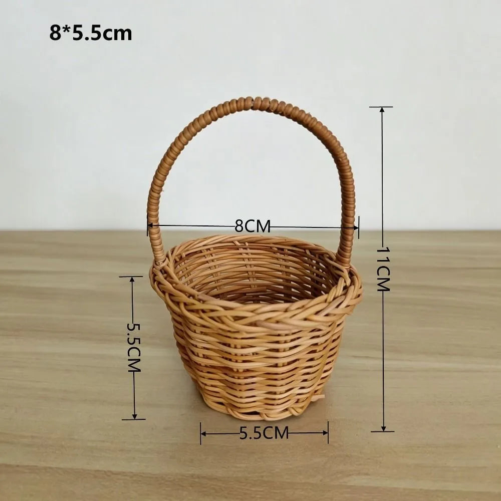 A handwoven rattan storage basket with handles, measuring 8x5.5 cm.