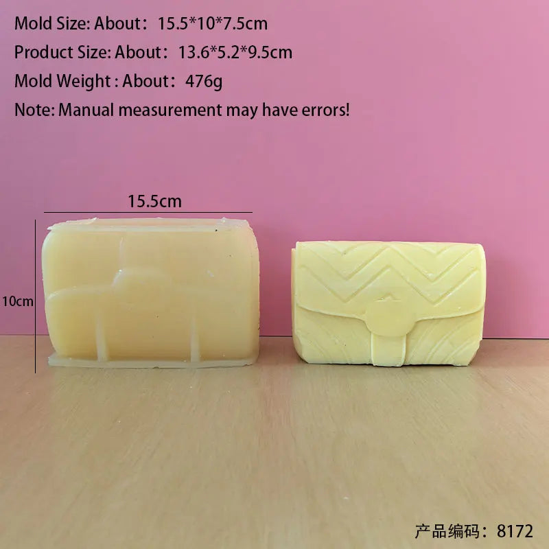 A rectangular yellow silicone mold for making candles or crafts is shown next to a measurement scale.