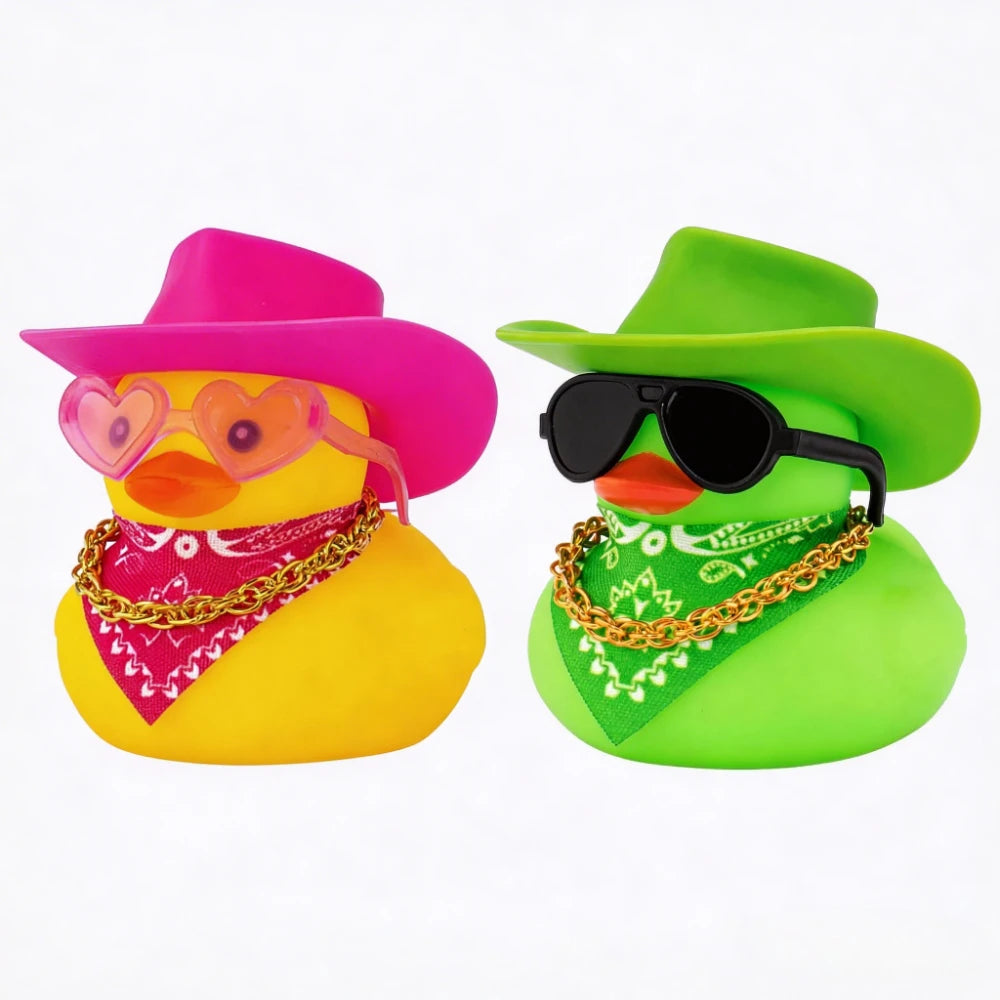 A yellow rubber duck wearing a pink cowboy hat and a red bandana, next to a green rubber duck wearing a lime green cowboy hat