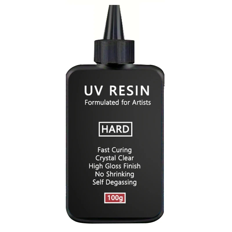 A black bottle of UV resin formulated for artists with a black dropper top.