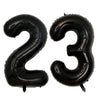 A set of two giant black foil balloons shaped like the number 23