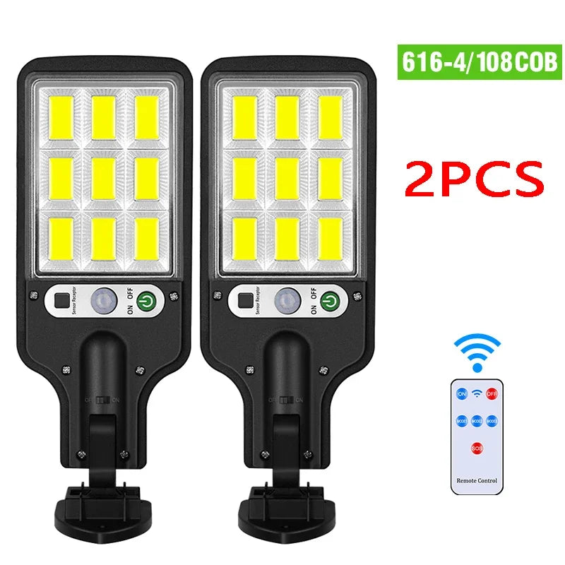 Two solar-powered motion sensor LED security lights with remote controls