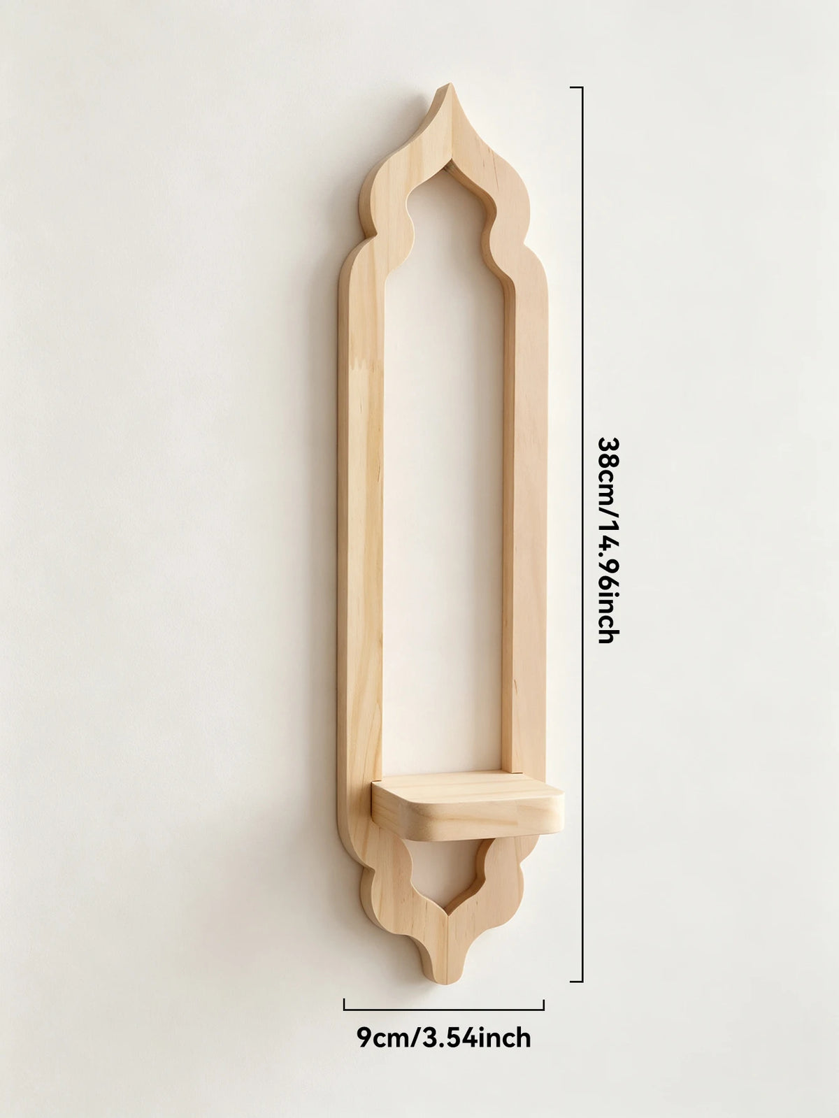 A vertical wooden wall shelf shaped like an arch with a decorative top and a small shelf underneath.