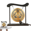 A black Feng Shui Zen table gong featuring a brass plate with dragon and Taiji symbols.