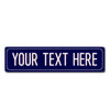 A dark blue rectangular metal street sign with the text YOUR TEXT HERE engraved on it.