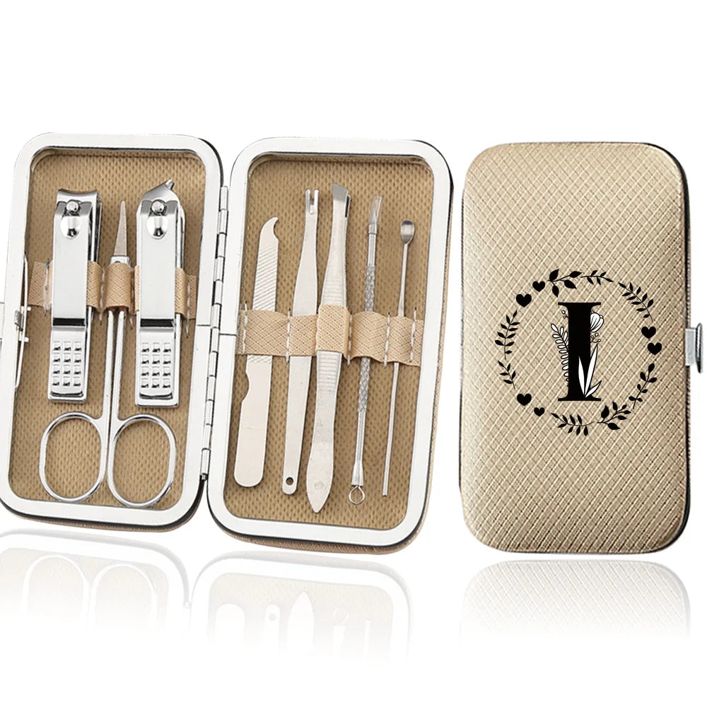 An open leather case displaying an 8-piece stainless steel manicure and pedicure kit with various tools.