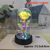 An LED galaxy rose artificial flower displayed inside a glass dome on a black base.