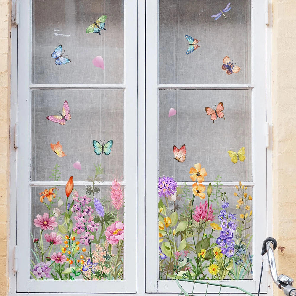 Window decals featuring colorful butterflies and flowers on a glass pane