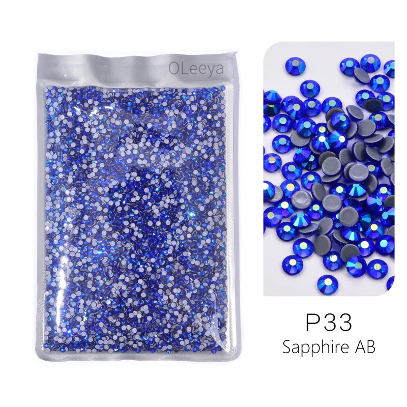 Bag of P33 Sapphire AB glass rhinestones in various sizes and colors